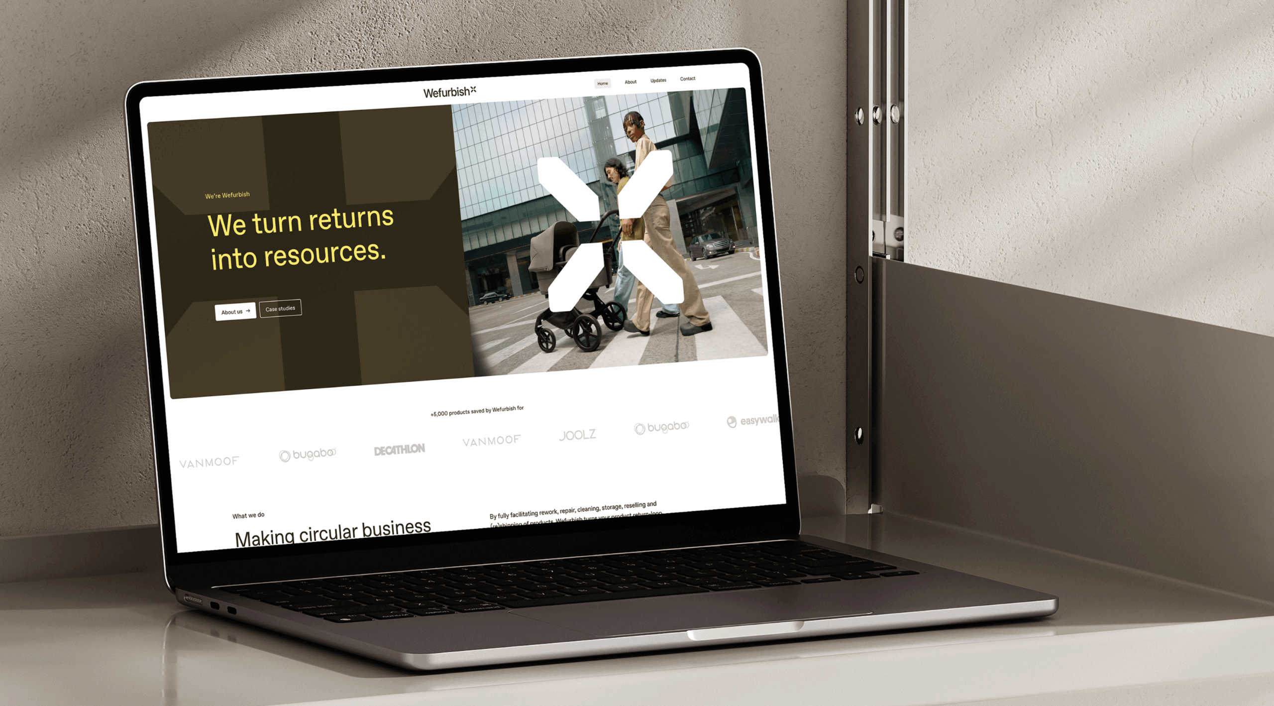 Wefurbish website in laptop on shelf